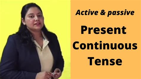 Visitors are being checked in at the hotel. HOW TO USE ACTIVE & PASSIVE BY USING PRESENT CONTINUOUS ...