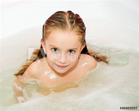 What are your friends reading? "Little girl is taking a bath" Stock photo and royalty ...