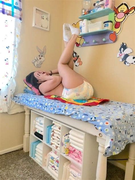 To do this, lift your baby's bottom off the how do i put a new disposable nappy on my baby? Pin by Roy Miller on put back in diapers in 2020 | Diaper ...