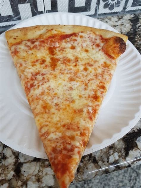 Ron rocky coloma's order of a cheese pizza slice and a can of coke at 99 cent fresh pizza on broadway in new york city. 99 Cent Pizza New York - tombaileydesign