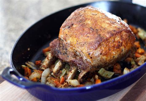 Hubs put the munchkin to bed and we all retired to the couch. Spiced Pork Rib Roast on a Bed of Vegetables Recipe