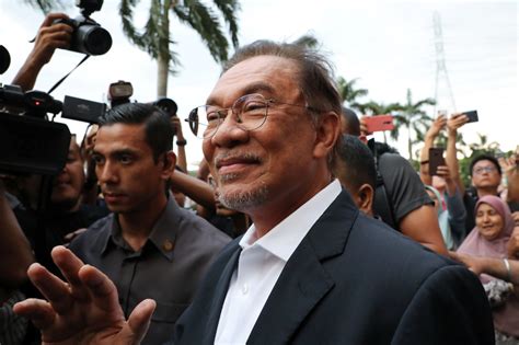 Show your identification card (malaysian nric). Malaysia police to summon Anwar over list of backers of PM ...