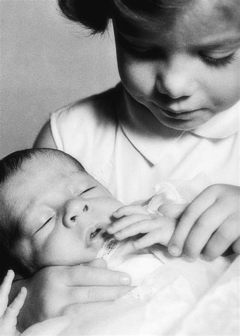 6,744 likes · 15 talking about this. "Caroline Kennedy with her newborn brother, John F ...