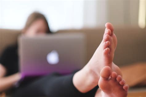 Laptop & Feet Royalty-Free Stock Photo and Image