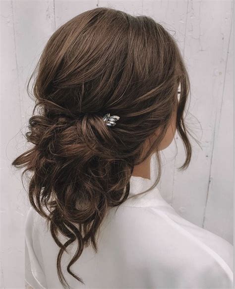 Two words that can perfectly describe half bun are: Loose Updo | Messy hairstyles, Low bun wedding hair, Loose ...