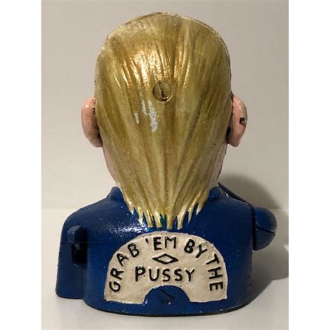 A clockwork key is required (one is included); Sold Price: Explicit DONALD TRUMP Cast Iron Mechanical ...