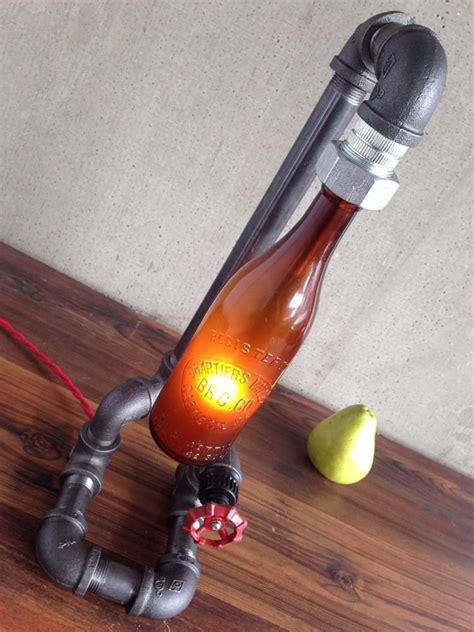 1) take your scored bottle to a sink. Antique Beer Bottle Lamp (With images) | Beer bottle lamp ...