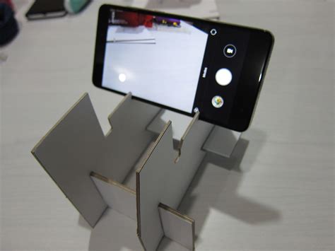 Don't spend money on expensive professional camera stands before watching this! Gadgets and stuff: DIY Smartphone Camera stand from Cardboard