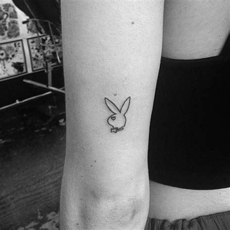 Check spelling or type a new query. Small Playboy logo tattoo on the back of the left arm.