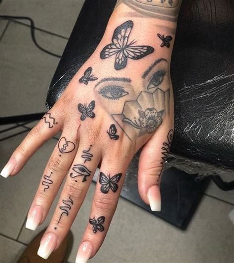 The latest trend when it comes to finger tattoos is is a wedding ring or band finger tattoo. Pinterest @QueenE93_ | Hand tattoos for women, Simple hand ...