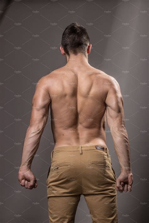 Within this group of back muscles you will find the latissimus dorsi, the these muscles collectively work to help movements of the vertebral column and to also control posture. Bodybuilder back rear view muscles ~ Sports Photos ...