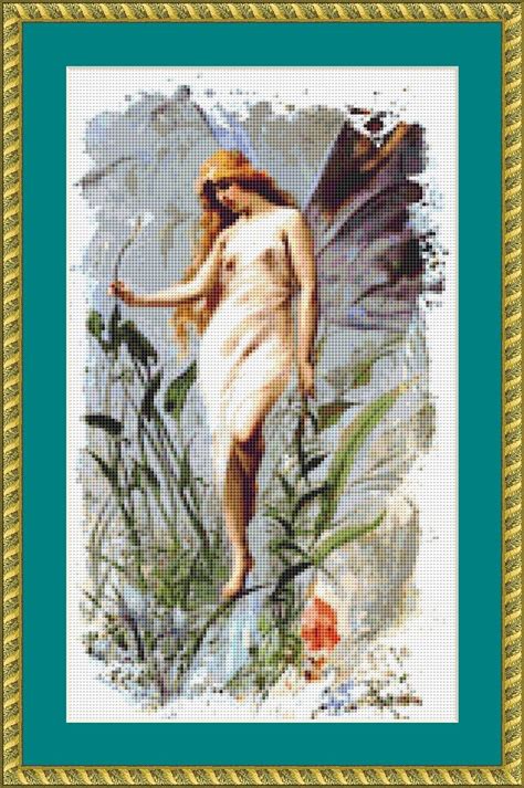 Free online christmas cross stitch patterns. Fairy With A Lily Cross Stitch Pattern by Avalon Cross Stitch