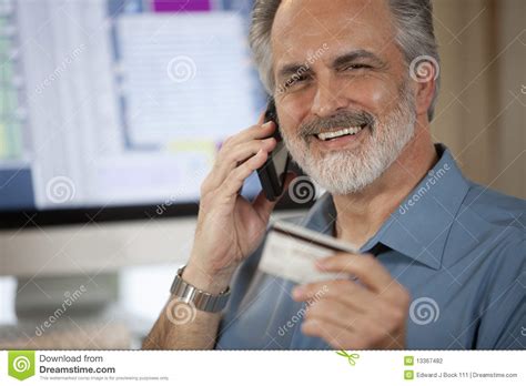 You need to know how to give your credit card number over the phone to make sure that the transaction is completed swiftly and accurately. Businessman Paying Over Phone With Credit Card Stock Photo - Image of facial, businessman: 13367482