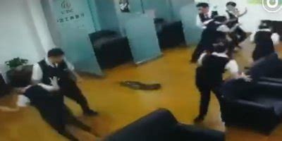 But bank clerks in southern china's nanning city will gladly go without any excitement or distractions from now on after an unwelcome visitor dropped in on friday morning. Watch: Python falls through the ceiling during staff meeting