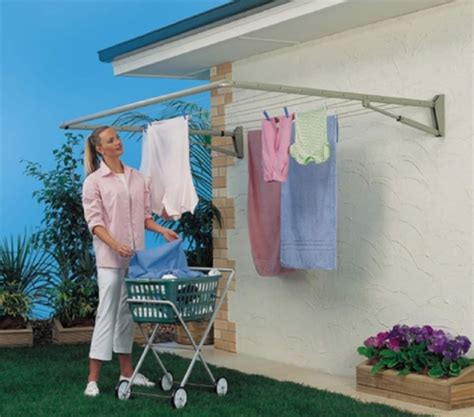 This is a great clothes drying rack for next to the pool or on the balcony or deck at the beach. Wall Mount Folding Drying Rack | Arredamento da esterno ...