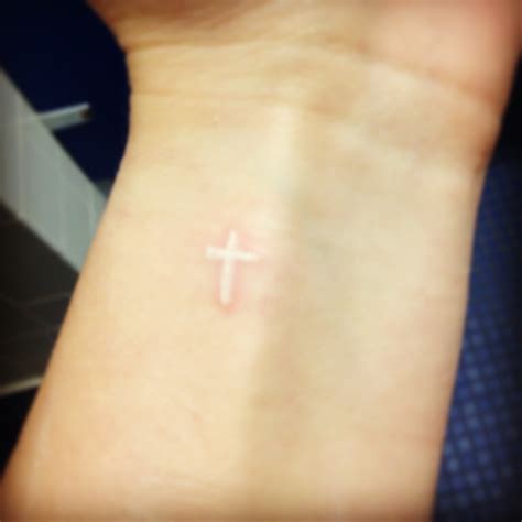 Hello, thanks for all the info. White ink cross tattoo | Tattoos I love and want