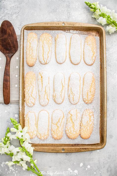 Prepare a cookie tray with baking paper. How to Make Lady Fingers Cookies - This Silly Girl's Kitchen