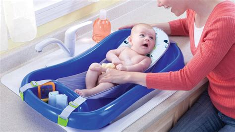 When he was too big for baby bath i put him in the kitchen sink which was much easier for me. How To Give Your Baby A Bath