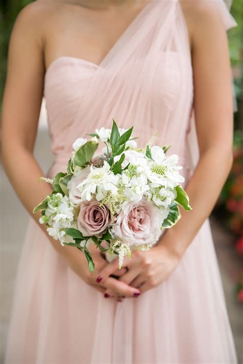 A pastel spring wedding bouquet with lilac, blush, green and light pink flowers for a spring bride. Blush, White, and Green Bouquet http://www ...