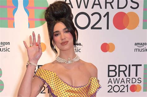 © 2021 billboard media, llc. Dua Lipa Channels Amy Winehouse at Brit Awards 2021 ...