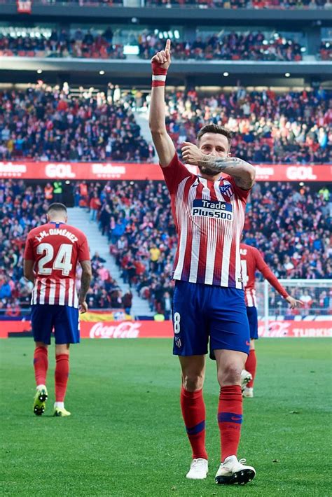 Maybe you would like to learn more about one of these? Saul Niguez of Atletico de Madrid celebrates after scoring ...