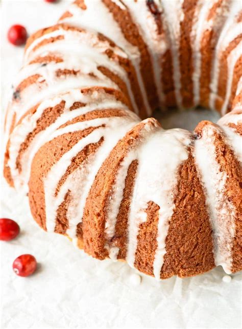 I love making and eating cranberry desserts during the holiday season! Cranberry Sour Cream Coffee Cake - WellPlated.com