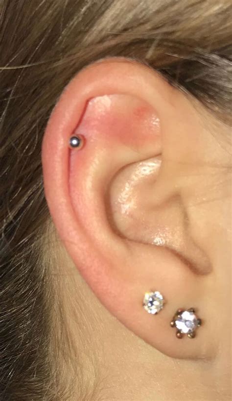 I googled what do you do when you have your ears pieces and they haven't healed and she's going swimming. 1st and 2nd hole with cartilage piercing | Piercings, Ear ...