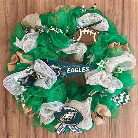 Wreath details • approximately 20 diameter • deco mesh, ribbon, & licensed nfl logo product • strung with battery operated string of 20 led lights. Philadelphia Eagles LED Wreath (With images) | Ball wreath ...