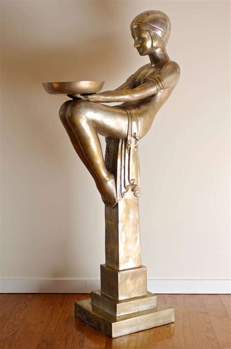 Both the use of strong colours but also of light pastel colours. A Rare Art Deco Female Sculptural Figure and Pedestal at ...