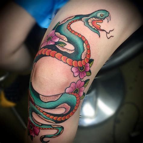 Black snake tattoo on the leg. 85 Mind-Blowing Snake Tattoos And Their Meaning ...