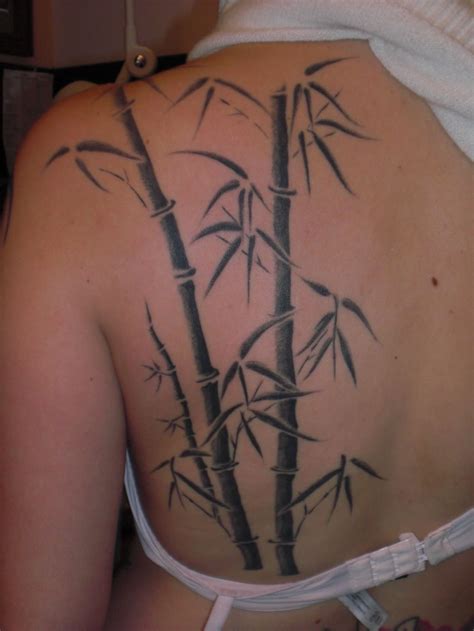 Future tattoos love tattoos beautiful tattoos body art tattoos tatoos tattoo art nape tattoo bug tattoo moth tattoo design. Black Ink Bamboo Tree Tattoo On Women Left Back Shoulder | Bamboo tattoo, Tattoo designs and ...