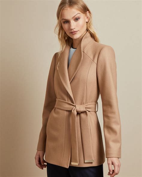 Meghan markle has a wardrobe full of coats we're sure kate middleton would love to borrow. DRYTAA Short belted wool wrap coat #TedToToe in 2020 ...