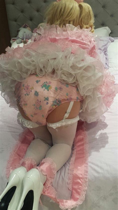 Under her pajamas is a purple diaper, approximately the size of a large pumpkin. 135 best Sissy Diapers images on Pinterest