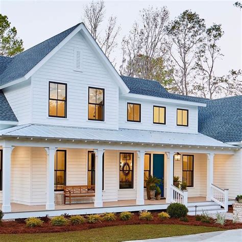 Families love the informal feel of a great room. Home Bunch on Instagram: "Modern farmhouse: White siding ...