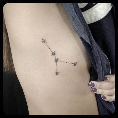 Virgo zodiac sign in grunge distressed style temporary tattoos. Cancer Constellation: Girl Star Tattoos on the Ribcage ...