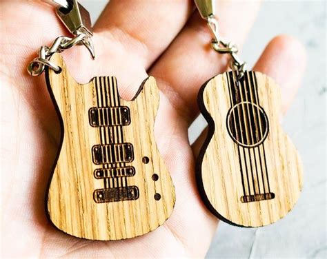 Check out our gift for guitar player selection for the very best in unique or custom, handmade pieces from our picks & slides shops. Guitar Keychain | Unique items products, Custom keychain ...