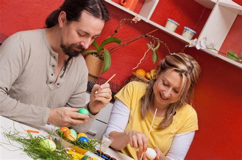 Maybe you would like to learn more about one of these? Couple Painting Easter Eggs Together Stock Image - Image ...