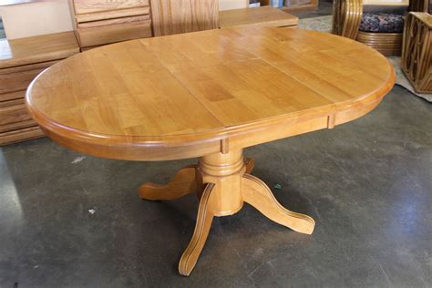 Whether you are searching for inspiration and design tips for your dining room design or looking for some expert advice, you can find it all here. ROUND MAPLE DINING TABLE WITH JACK KNIFE LEAF AND FOUR OAK ROLLING CHAIRS - Big Valley Auction