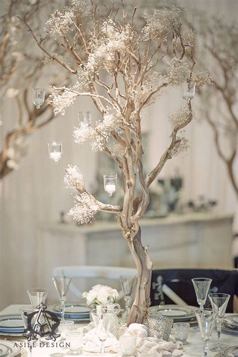 With the right wedding decoration ideas, a couple can have an elegant, stylish event without breaking the bank. Baby's breath manzanita tree centerpiece. | Yelp ...