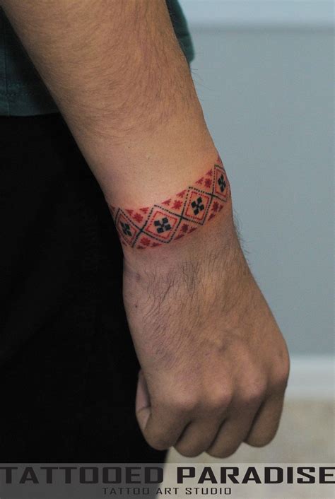 oleg-rudenko-traditional-tattoo-cuff,-cuff-tattoo,-embroidery-tattoo