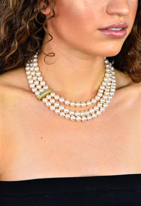 Shop creations of timeless beauty and superlative craftsmanship that will be treasured always. Tiffany and Co. Diamond Pearl 18 Karat Yellow Gold Triple ...