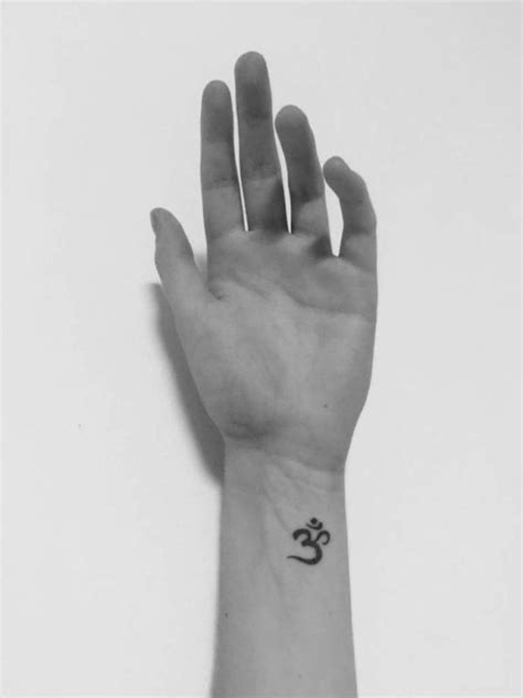 The designs on the side wrist are pretty simple. 46 Om Tattoo On Wrists