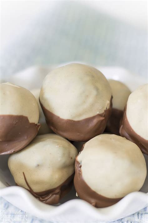 Chubby hubby buckeye peanut butter truffles recipe. Buck Eye Truffle - Easy Buckeye Recipe - Sugar Spun Run / Smooth out the hole left by the ...