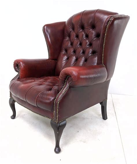 Check spelling or type a new query. Sold Price: BURGUNDY LEATHER TUFTED WING CHAIR. WOOD QUEEN ...