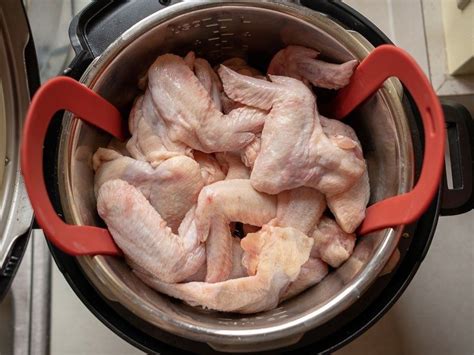 To learn how to empty and clean a chicken before. PicOfTheWeek: A Pot Full of Wings | Food recipes, Cooking whole chicken, Drumettes recipe