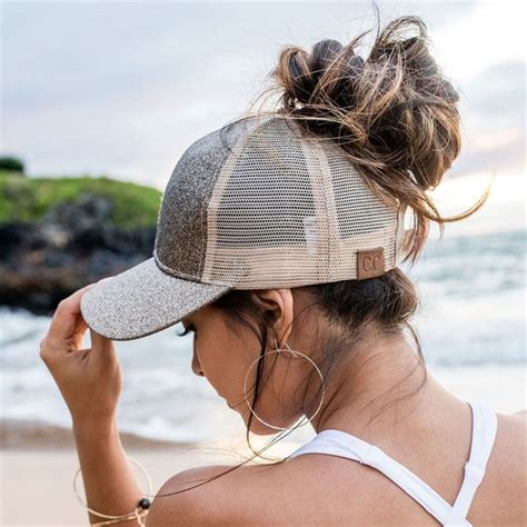 We found this great hairstyle online and had to share how instagram user shanillia26 created these throwback puffed ponytails. C.C® Glitter Messy Bun Caps in 2020 | Ball cap hair, Cute ...