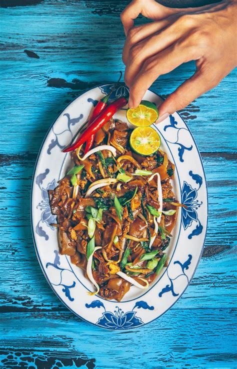 Kuey teow goreng or the fried flat noodles is one of the famous street food found across malaysia especially in penang region. Char kuey teow from Jackfruit and Blue Ginger by Sasha Gill