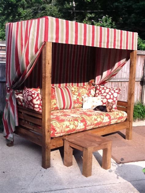 The attached canopy helps provide welcome shade when sitting on the swing. Diy Canopy For An Old Outdoor Swing - Outdoor daybed | Ana ...