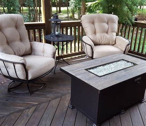 The aluminum base is powder coated in the another great feature of this fire pit is its hidden propane tank storage. OW Lee Santorini 30 x 50″ Hand Forged Fire Pit Table ...