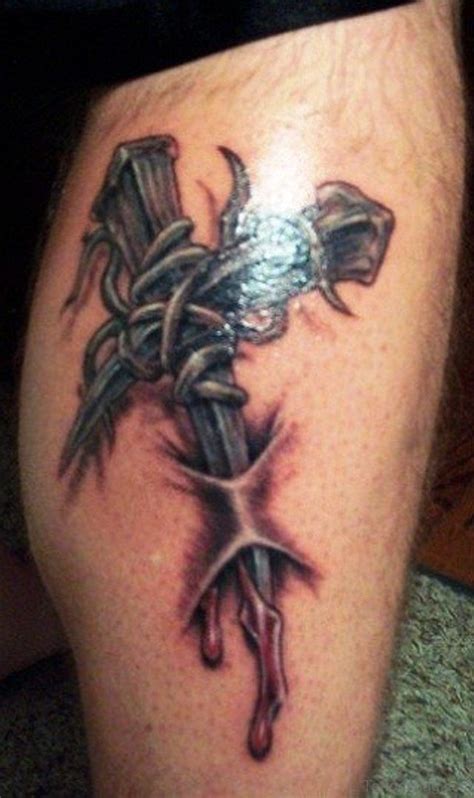 Reminding us of a fence that's painful to cross, a barbed wire tattoo represents the strength of people who have overcome traumatic experiences in life. 55 Antic Cross Tattoos For Leg